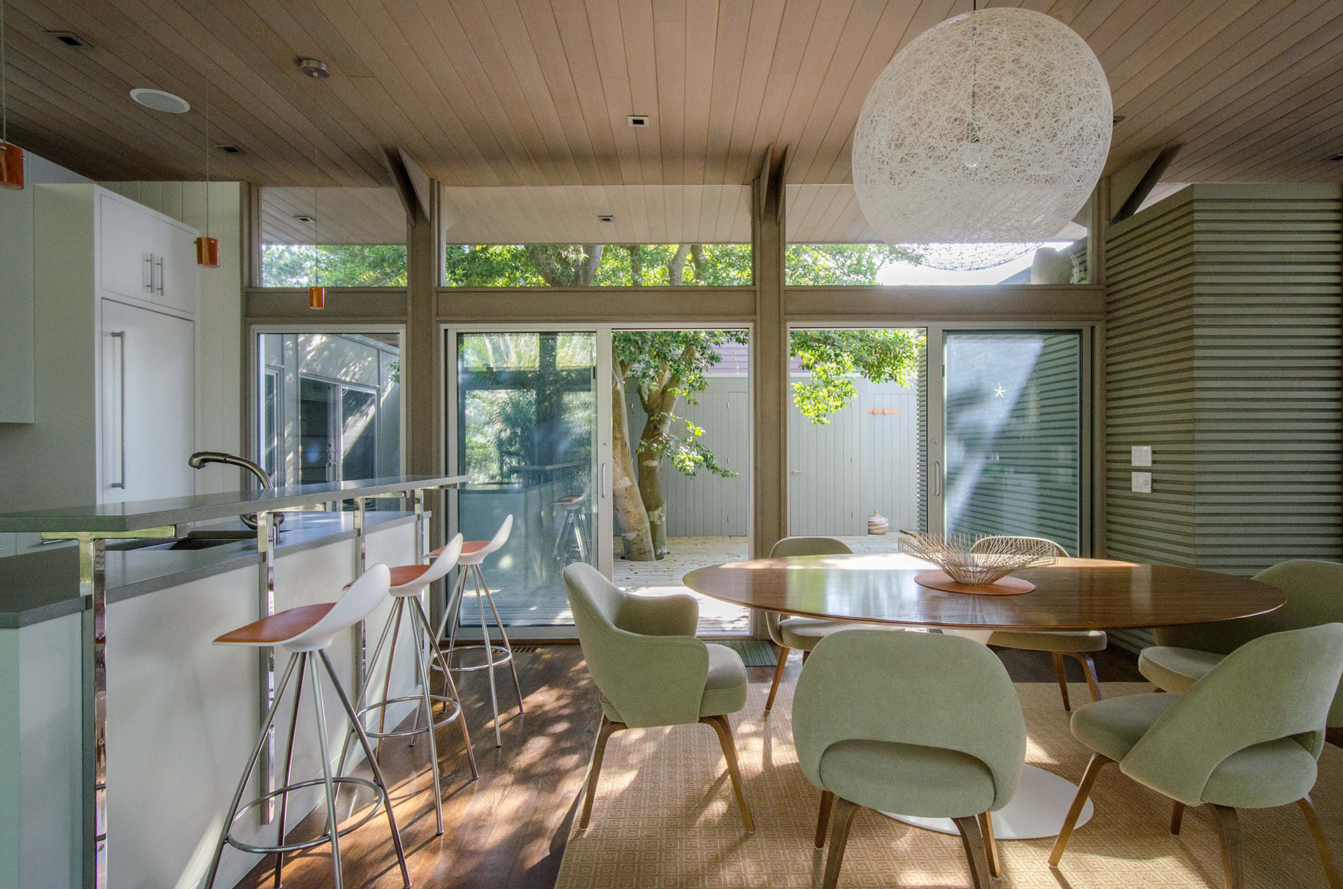 Dining Area and Kitchen in Mid-Century Modern Fire Island Pines Beach House | Rodman Paul Architects