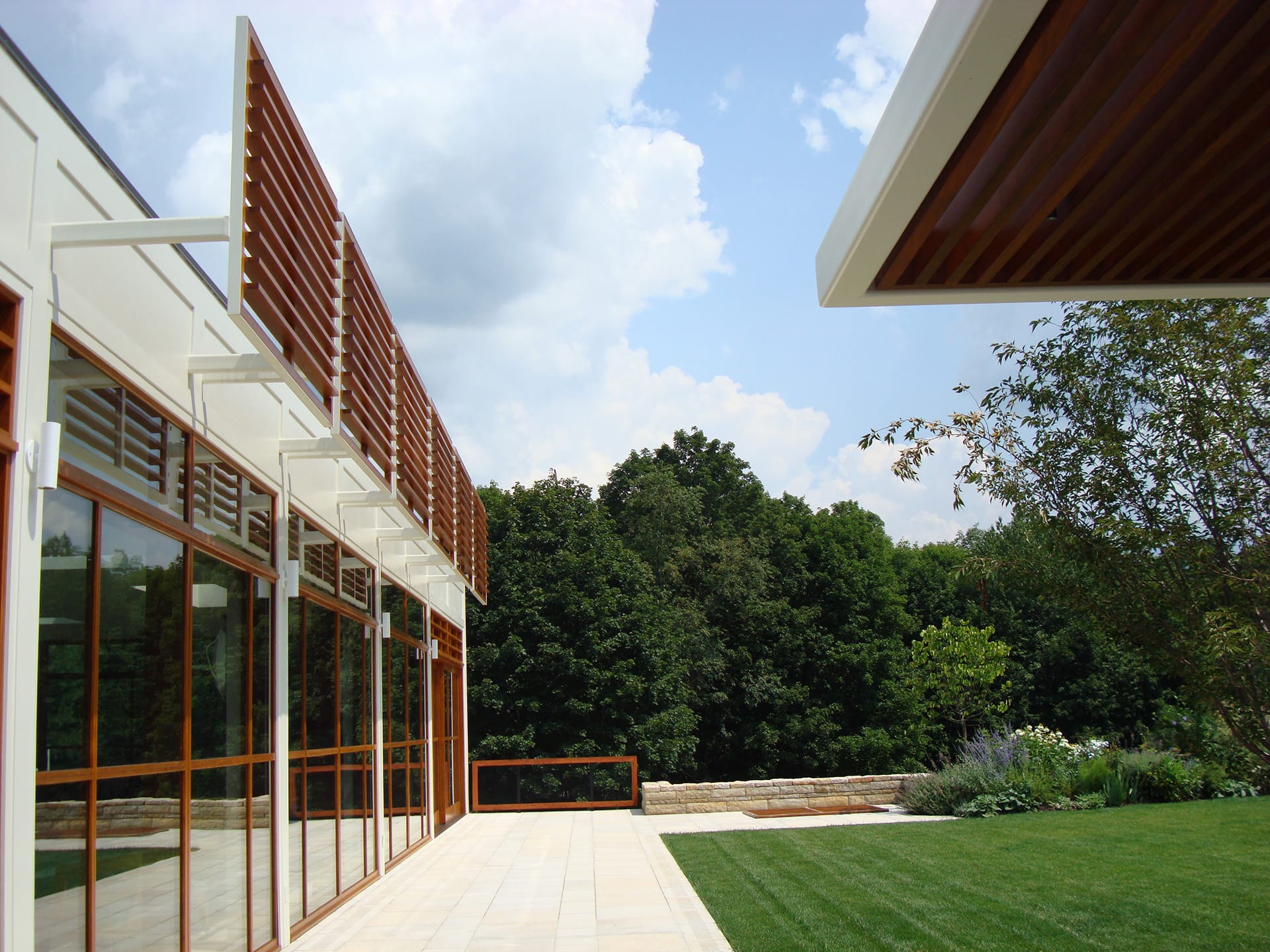 Pool house exterior at estate in Washington, Connecticut | Rodman Paul Architects