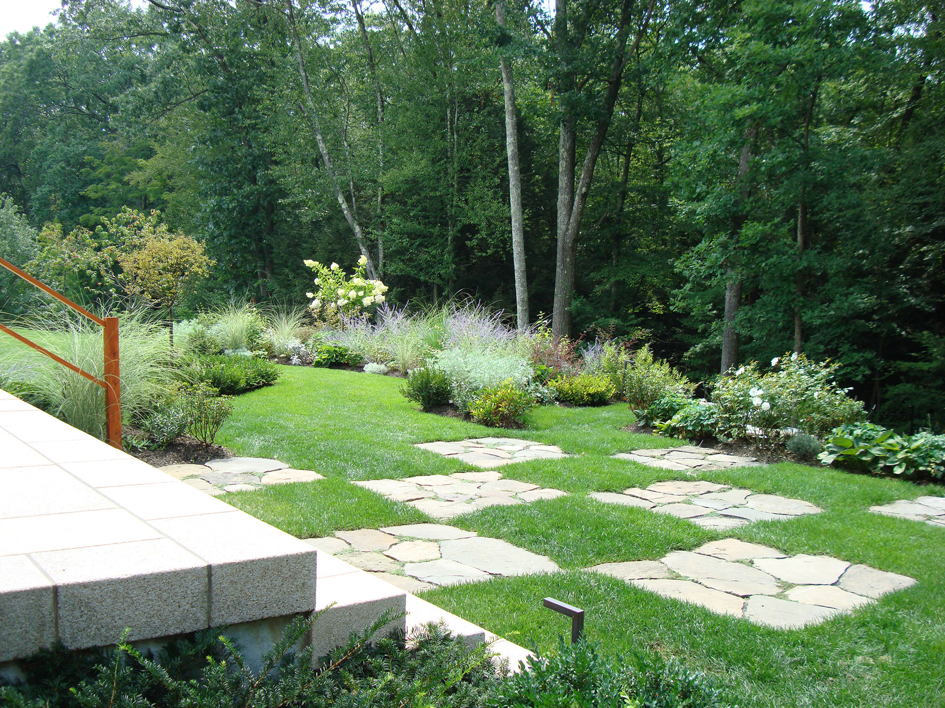 Checkerboard pathway at estate in Washington, Connecticut | Rodman Paul Architects