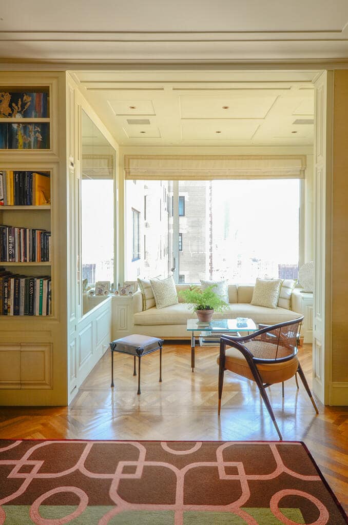 Living Room and Sunroom with Custom Carpet in Elegantly Renovated East Side Apartment | Rodman Paul Architects